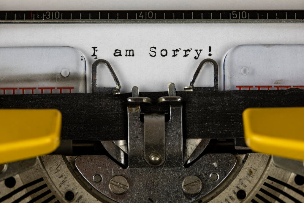 typewriter with "I am Sorry!"